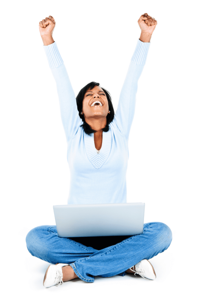 woman sitting with her laptop celebrating